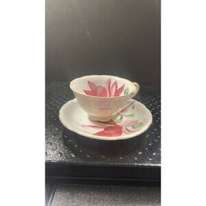 Merit Porcelain Tea Cup and Saucer - call out